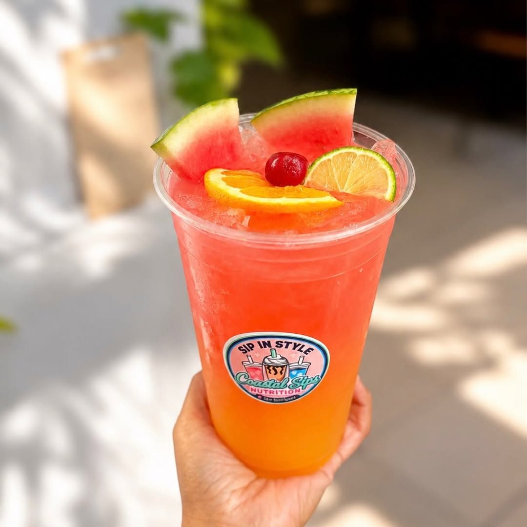 Sweet Magnolia drink topped with watermelon, orange and cherry